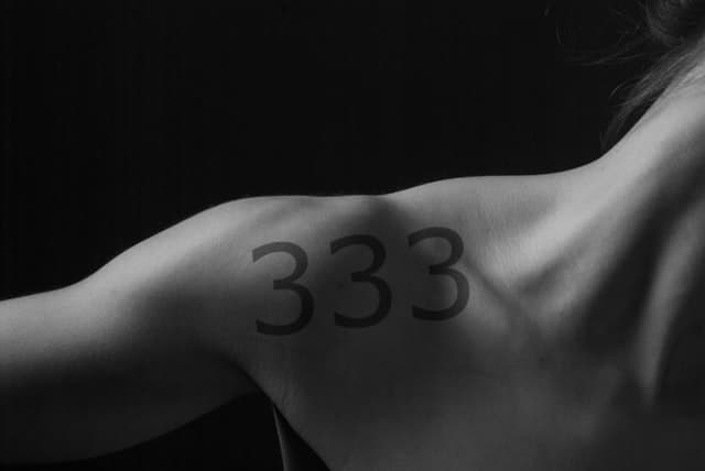 333 Tattoo Meaning & Symbolism