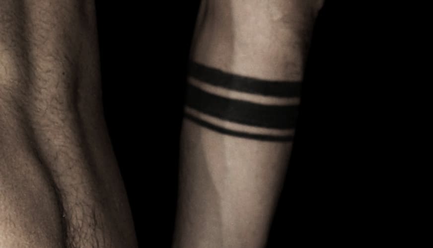 Black Line Tattoo Meaning & Symbolism