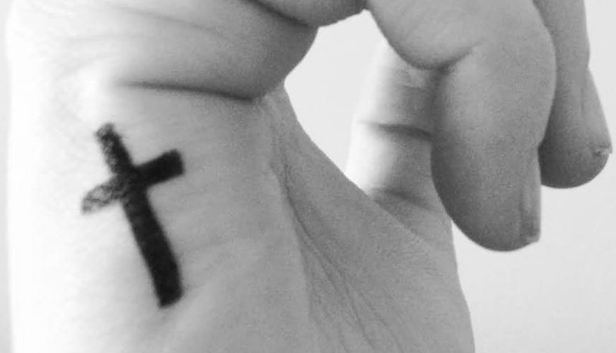 Cross on Hand Tattoo Meaning