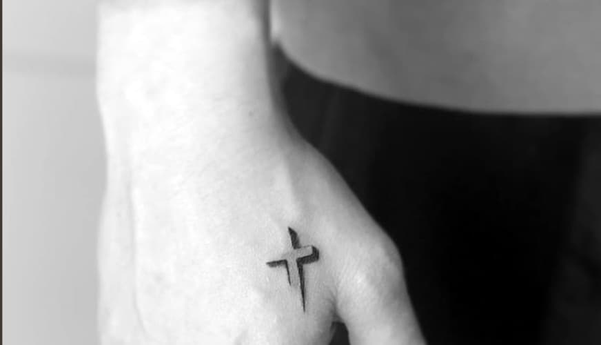 Cross on Hand Tattoo Meaning