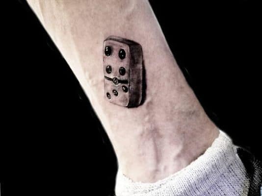 Domino Tattoo Meaning & Symbolism