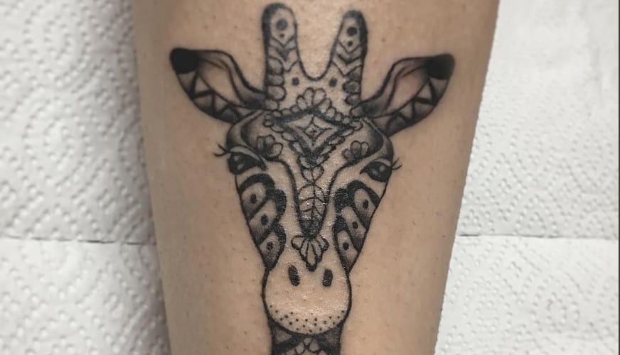 Giraffe Tattoo Meaning & Symbolism