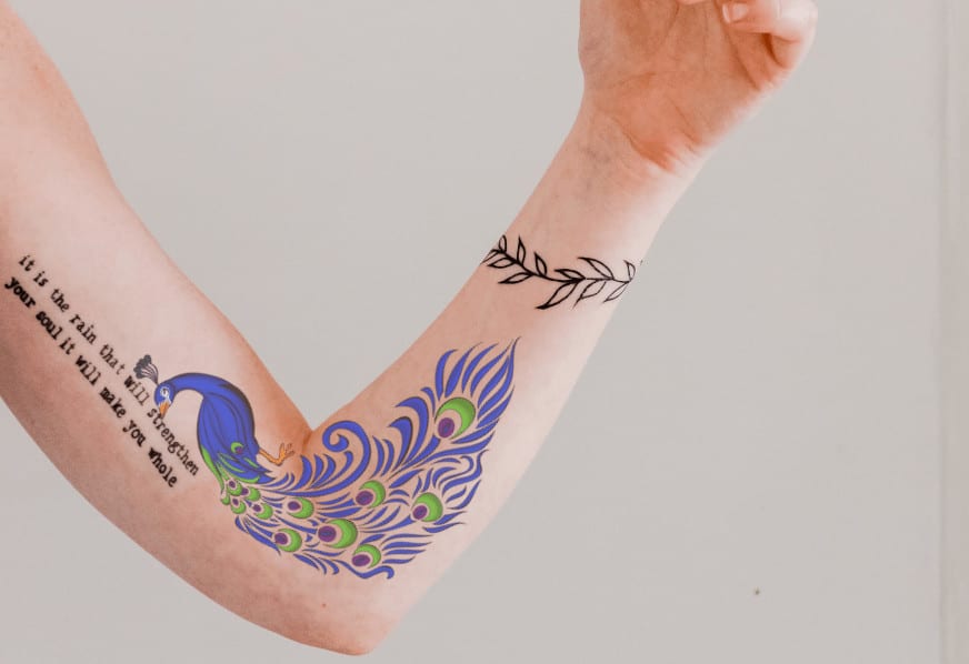Peacock Tattoo Meaning & Symbolism