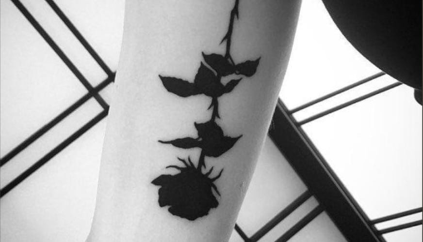 Upside Down Rose Tattoo Meaning & Symbolism